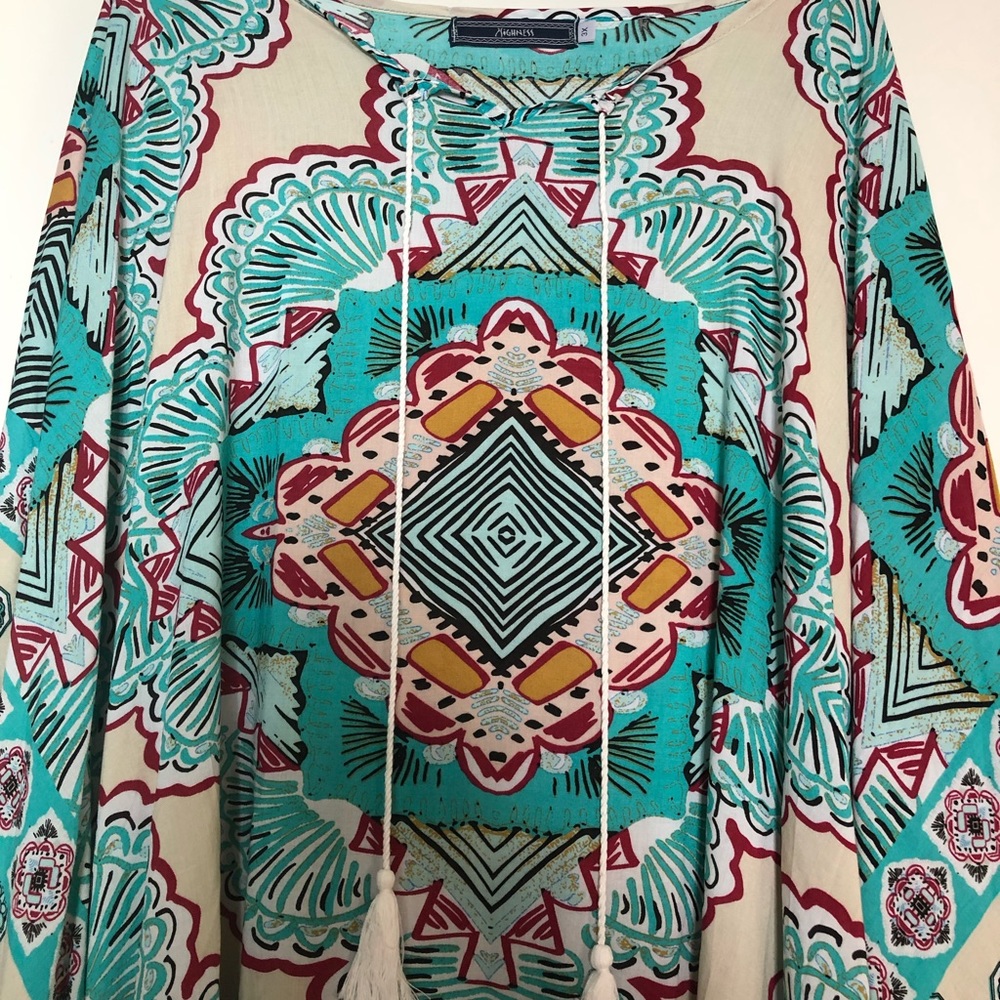 Gorgeous, comfortable, soft pull over top.
